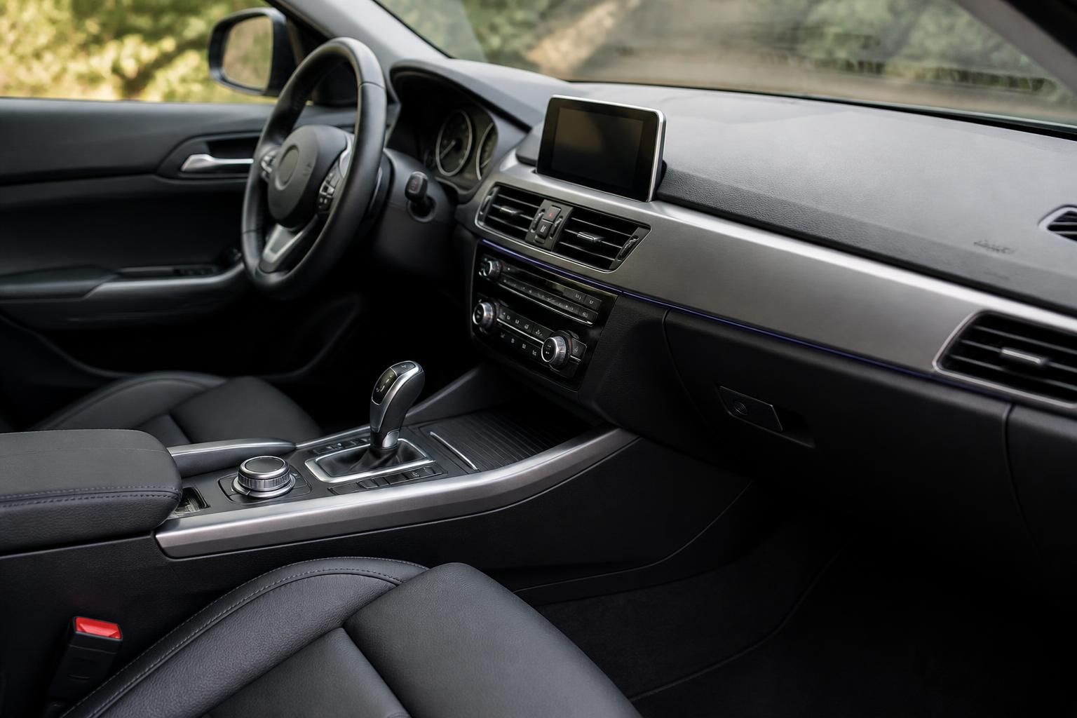 Spotless car interior with clean seats and dashboard surfaces.